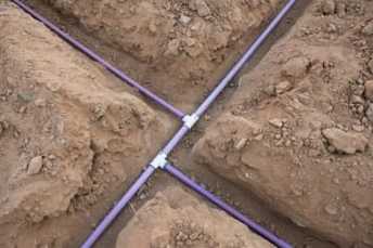 photo trenching service contractor water lines drain lines asheville nc